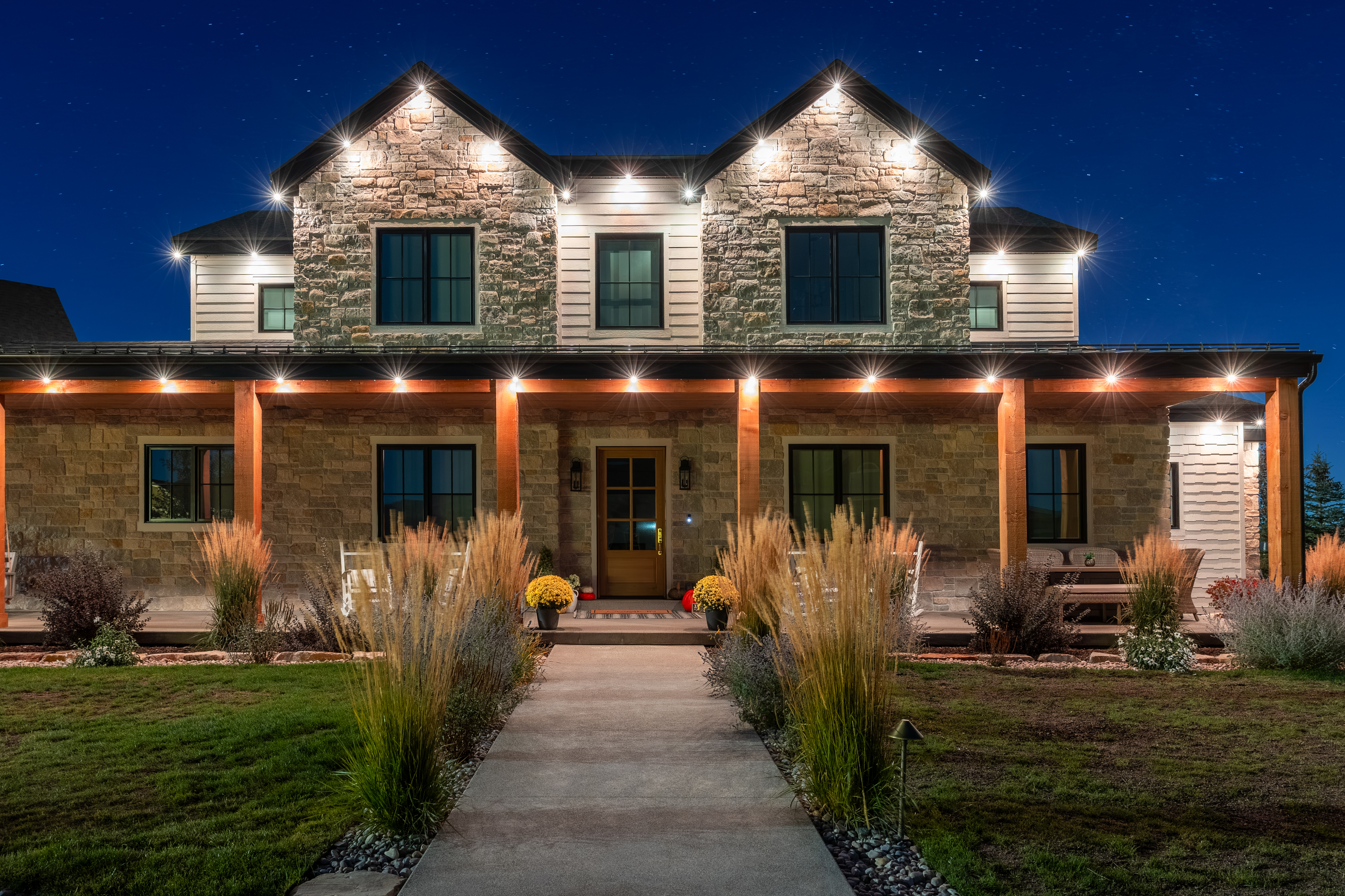 Home with roofline lighting installation